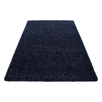 Bij zonsopgang Entertainment Anoi Karpetten blauw | Blauw hoogpolig vloerkleed - Vloerkleed en karpet